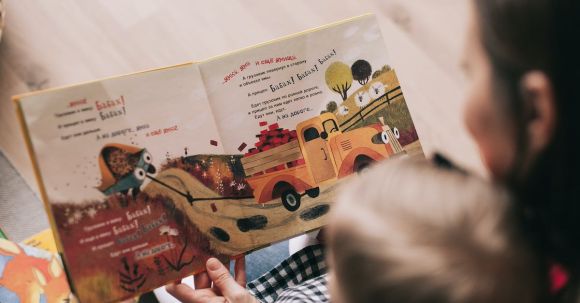 Storytelling Mastery - Woman Reading Book to Toddler