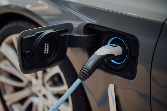 Electric Car - black and white usb cable plugged in black device