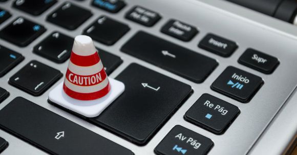 Data Privacy - White Caution Cone on Keyboard