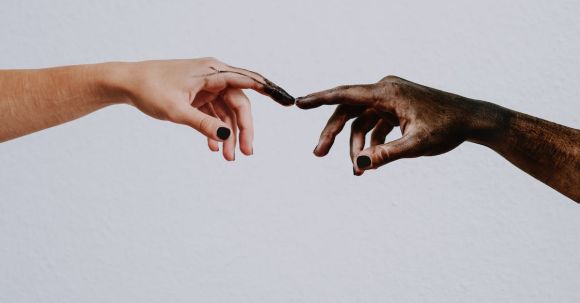 Global Collaborations - Hands of people reaching to each other